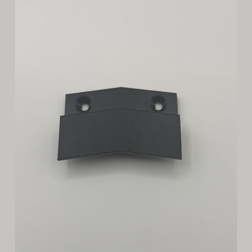 Black 3D printed Pot Lid Clip with two countersunk screw holes and an angled lip